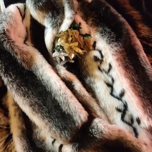 (2)two fur long knee length jackets selling both together.